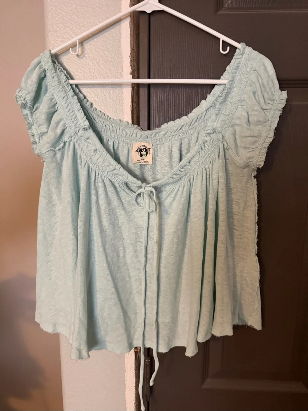 Brand new FREE PEOPLE brand.  We The Free Mint Green Peasant Tie-Front Tunic